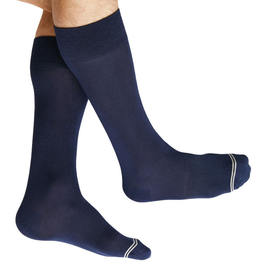 Navy dress socks on legs