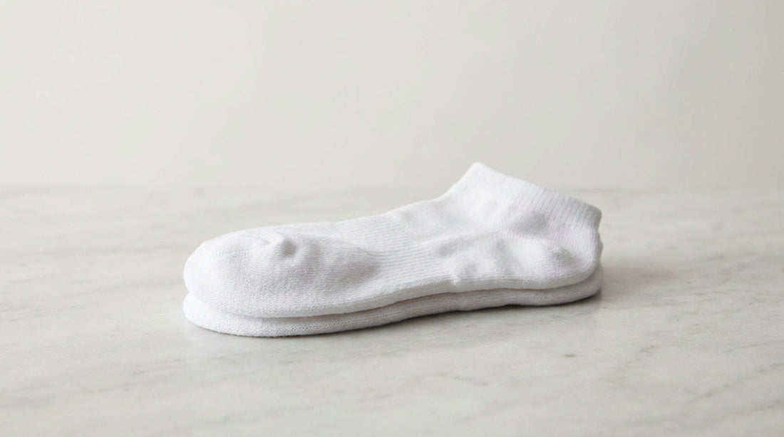 Premium white ankle socks with cushioned footbed and low-cut silhouette for everyday wear