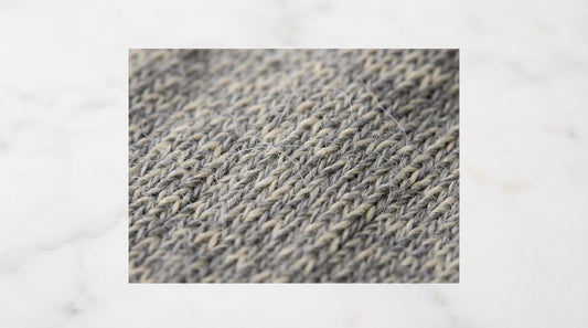 Close-up of nylon-blend sock fabric showing interlocked fiber structure