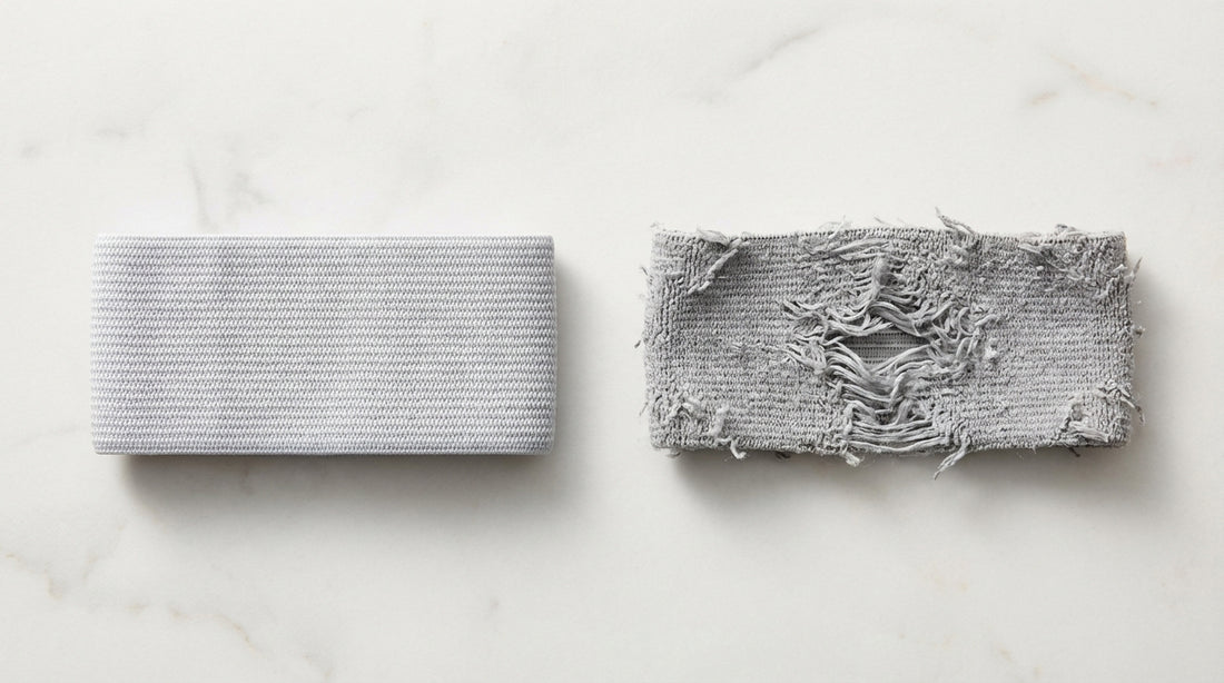 Close-up of stretched elastic cuff showing fiber degradation versus a new elastic cuff