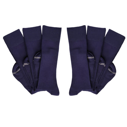 6 pairs of perfect navy boardroom socks folded at heel layered overtop one another
