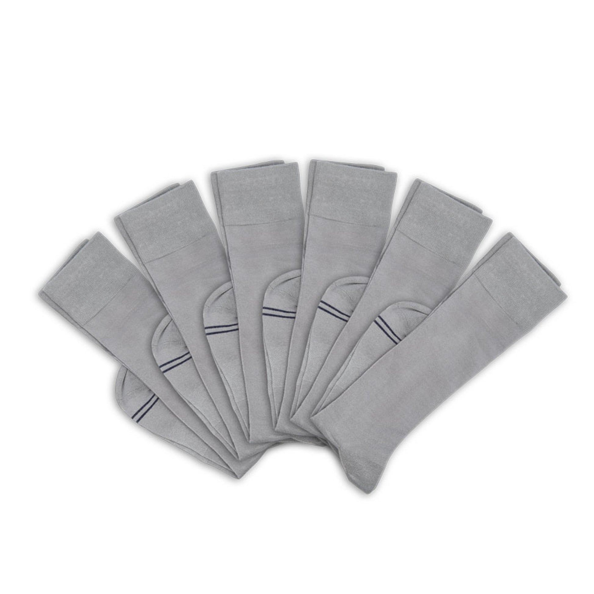 3 grey socks folded at ankle and layered on top of one another