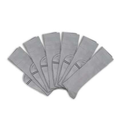 3 grey socks folded at ankle and layered on top of one another