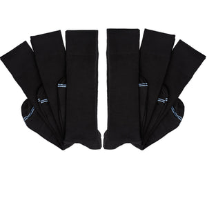 6 pairs of black socks folded at ankle and layered on top of one another