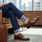 Allen dress socks worn in professional business meeting setting