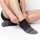 Black Socks ankle length on woman with breathable mesh in the top of the foot and arch support. 