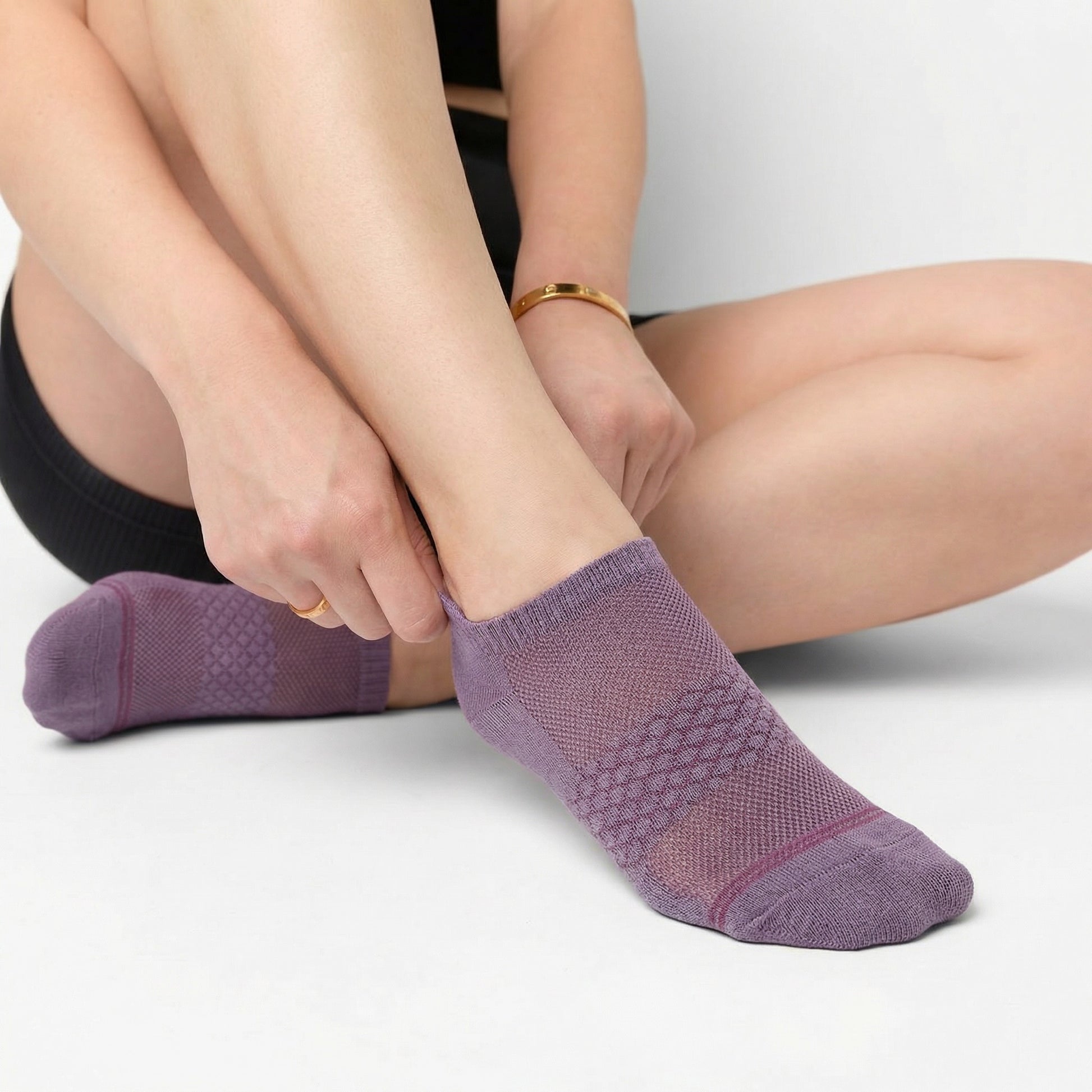 Purple women's ankle socks on female  