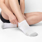 White Socks ankle length on woman with breathable mesh in the top of the foot and arch support. 