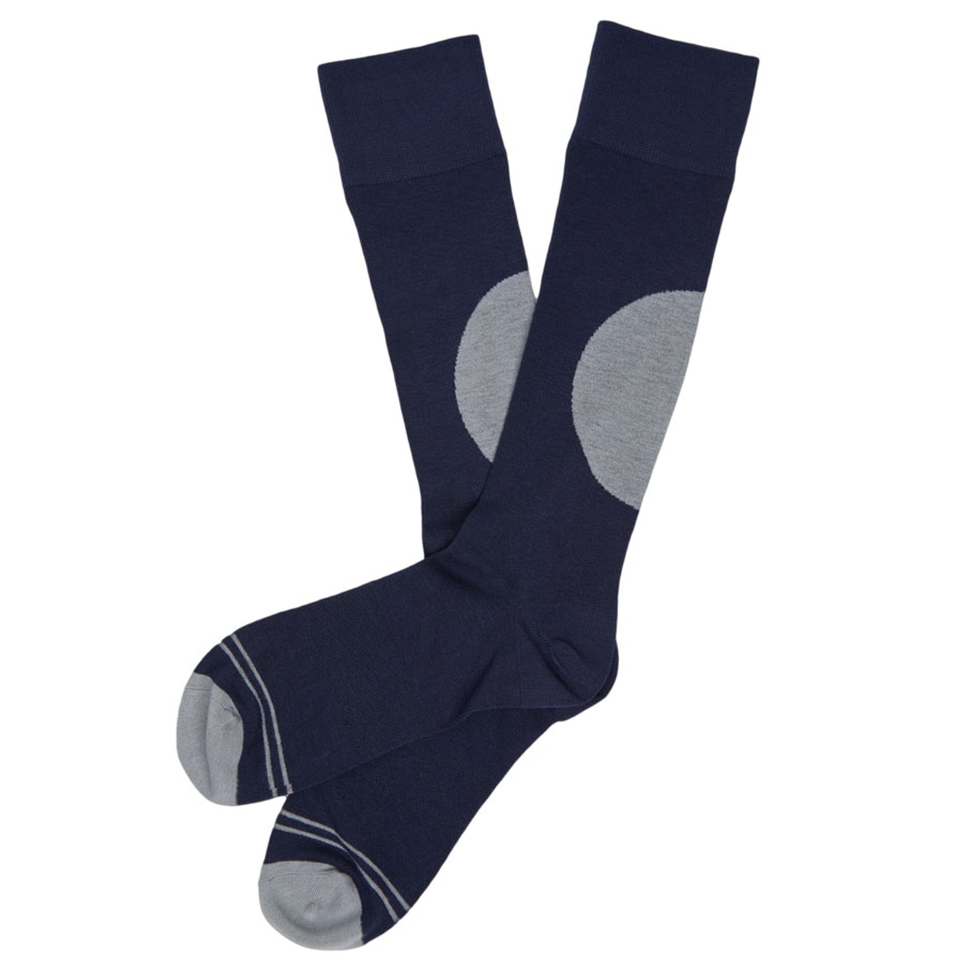 1 pair of navy dress socks lay flat crossed at the ankle with a large grey dot on the calf and a grey toe