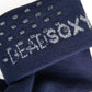close up view of navy sock welt with TrueStay‚Ñ¢ silicone dots