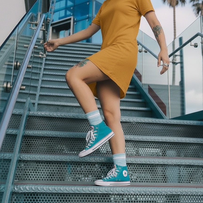 Lilac and white striped quarter crew sock worn by woman on stairs showing sock length is perfect