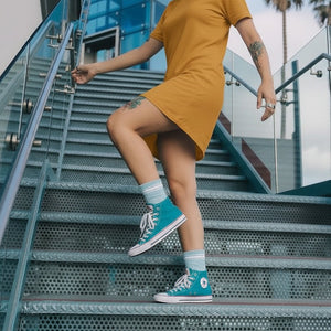 Lilac and white striped quarter crew sock worn by woman on stairs showing sock length is perfect