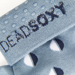 Close up view of light blue dress sock welt with TrueStay‚Ñ¢ silicone dots.