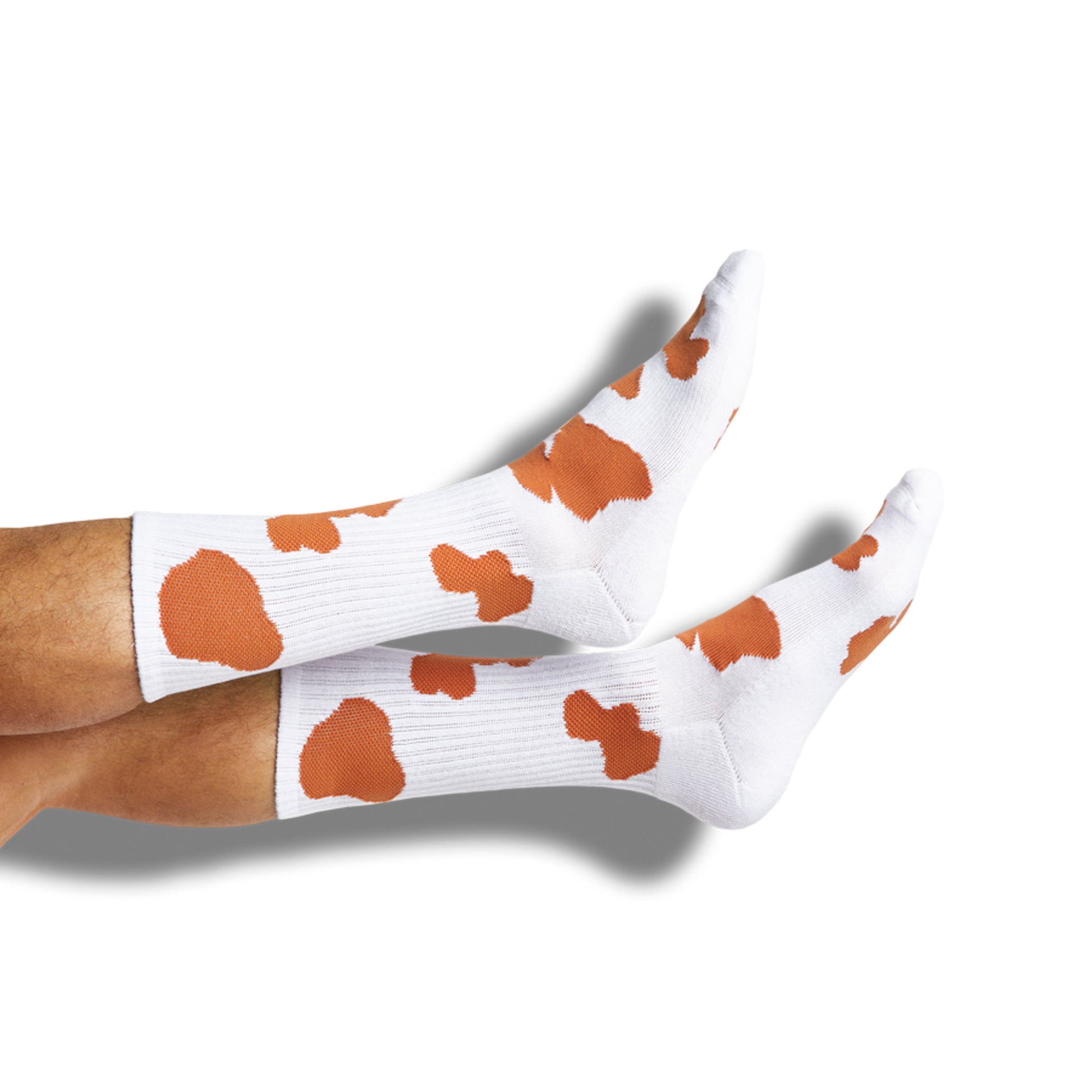 white and burnt orange cow print casual socks