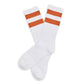 White casual socks with 2 burnt orange retro stripes on the leg lay flat