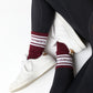 Maroon Retro Howdy Casual Crew Socks with vintage Howdy design from overhead