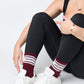 Maroon Retro Howdy Casual Crew Socks with vintage Howdy text in black leggings