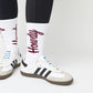 white casual crew socks with cushion and Howdy going up the leg on a woman in black leggings