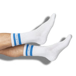 White and Blue casual socks with retro stripe and DeadSoxy on the welt shown on legs