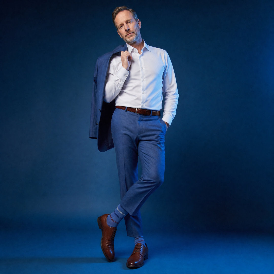 DeadSoxy Colton cotton dress socks styled with dress shoes in a studio setting