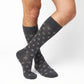 DeadSoxy Gerald cotton dress socks worn on leg in an alternate crossed-leg view