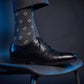 DeadSoxy Gerald cotton dress socks styled with dress shoes in a studio setting