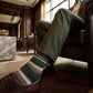 DeadSoxy Hayes cotton dress socks styled with dress shoes in a seated business setting