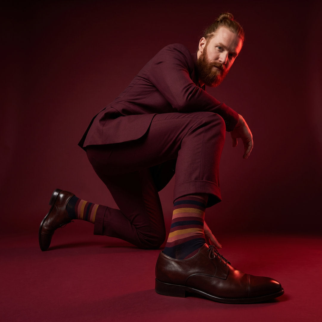 DeadSoxy Jasper cotton dress socks styled with dress shoes in a studio setting