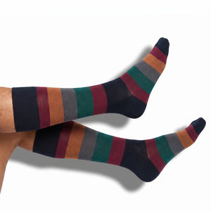 DeadSoxy Wells cotton dress socks worn on leg, showing the Fall 2026 pattern and fit