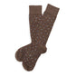 Brown dress sock laid flat showing full micro-dot pattern and construction.