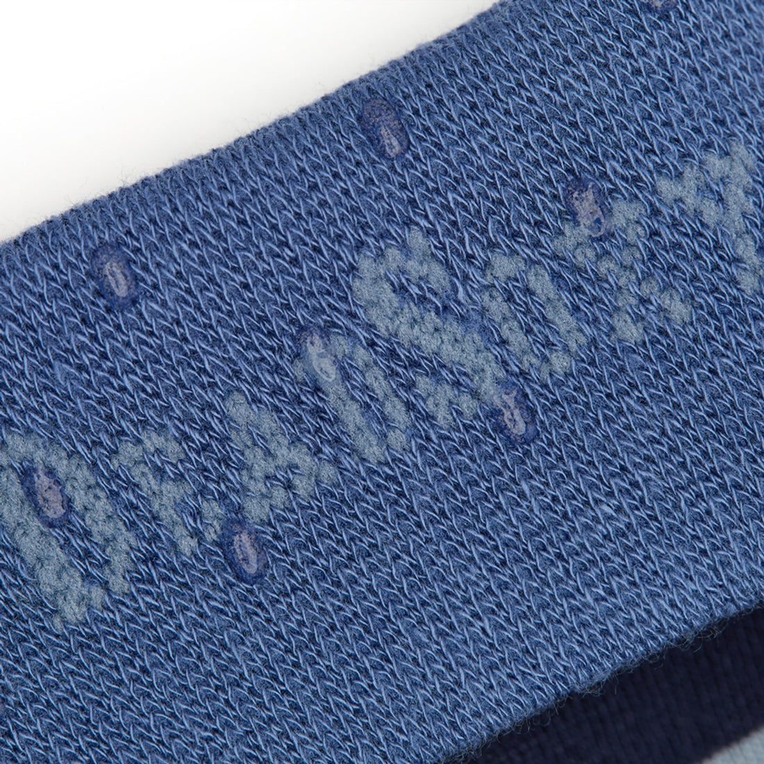 close up of the welt and TrueStay‚Ñ¢  blue-striped dress socks r