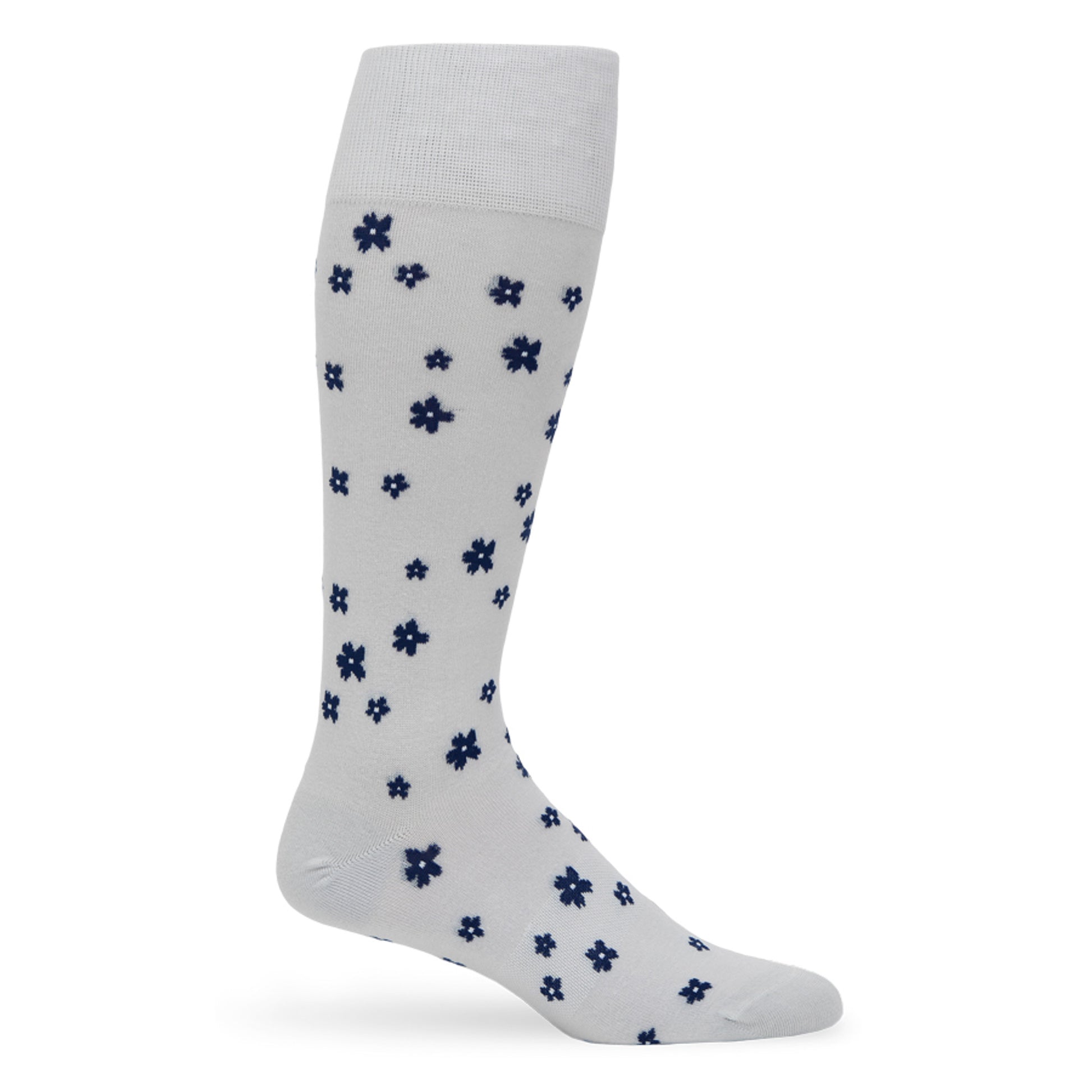 Drew floral men‚Äôs dress sock‚Äîlight grey base with navy mini flower pattern; TrueStay‚Ñ¢ non-slip cuff; supreme cotton yarn.