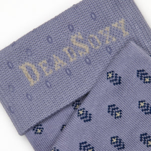 Close-up of Emmett dress sock welt detail showing lavender ribbed cuff