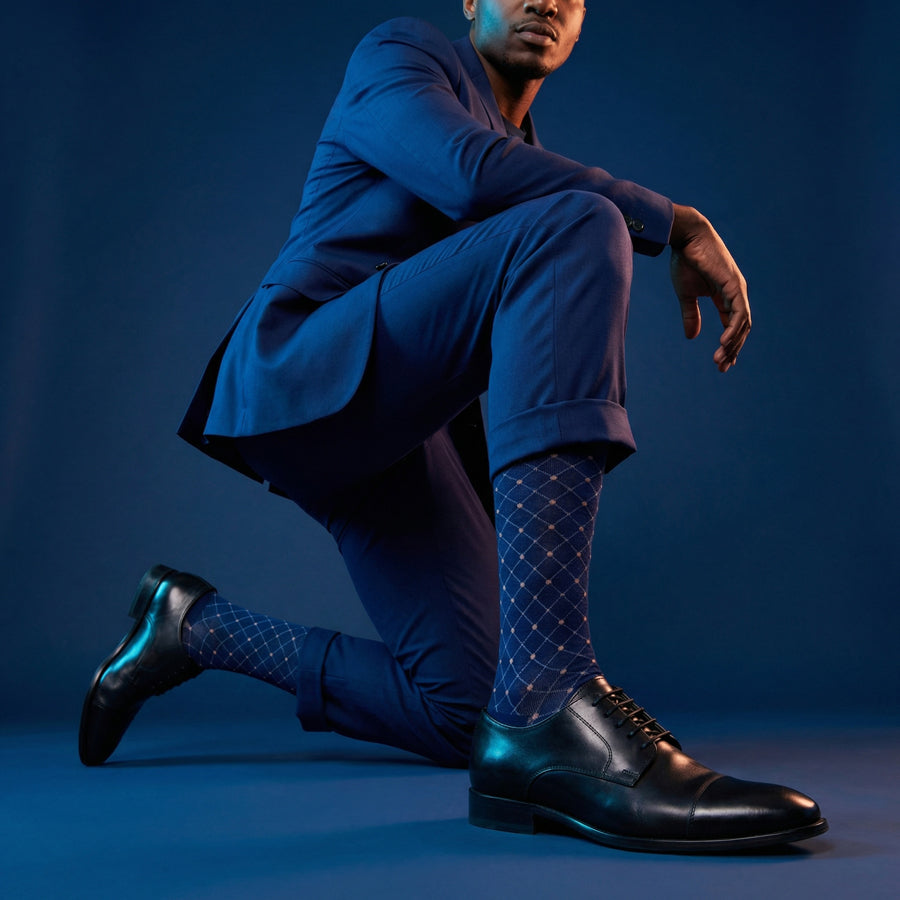 Fuller dress socks under neon lighting highlighting diamond pattern