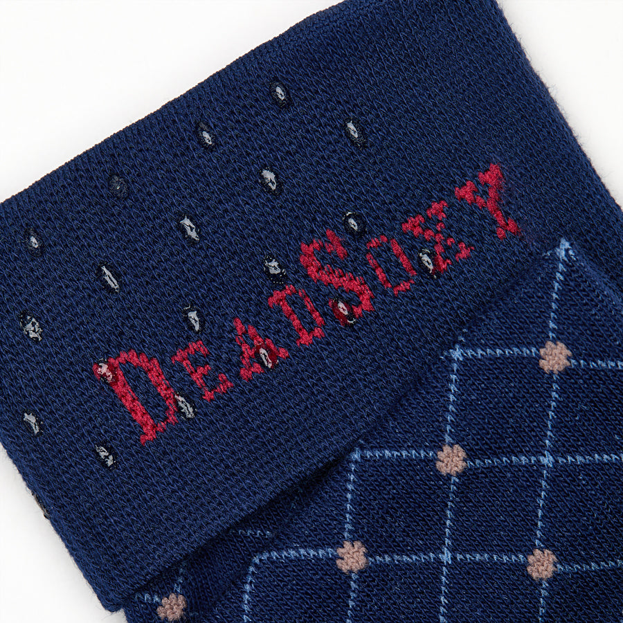 Close-up of Fuller dress sock welt detail showing deep navy ribbed cuff