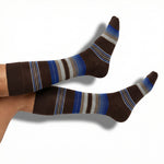 DeadSoxy Grant dress socks in brown and cobalt blue multi-stripe pattern worn on foot