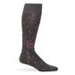 MSU Gray Cowbell Dress socks worn, showing scattered maroon cowbells and the interlocking MSU logo on charcoal