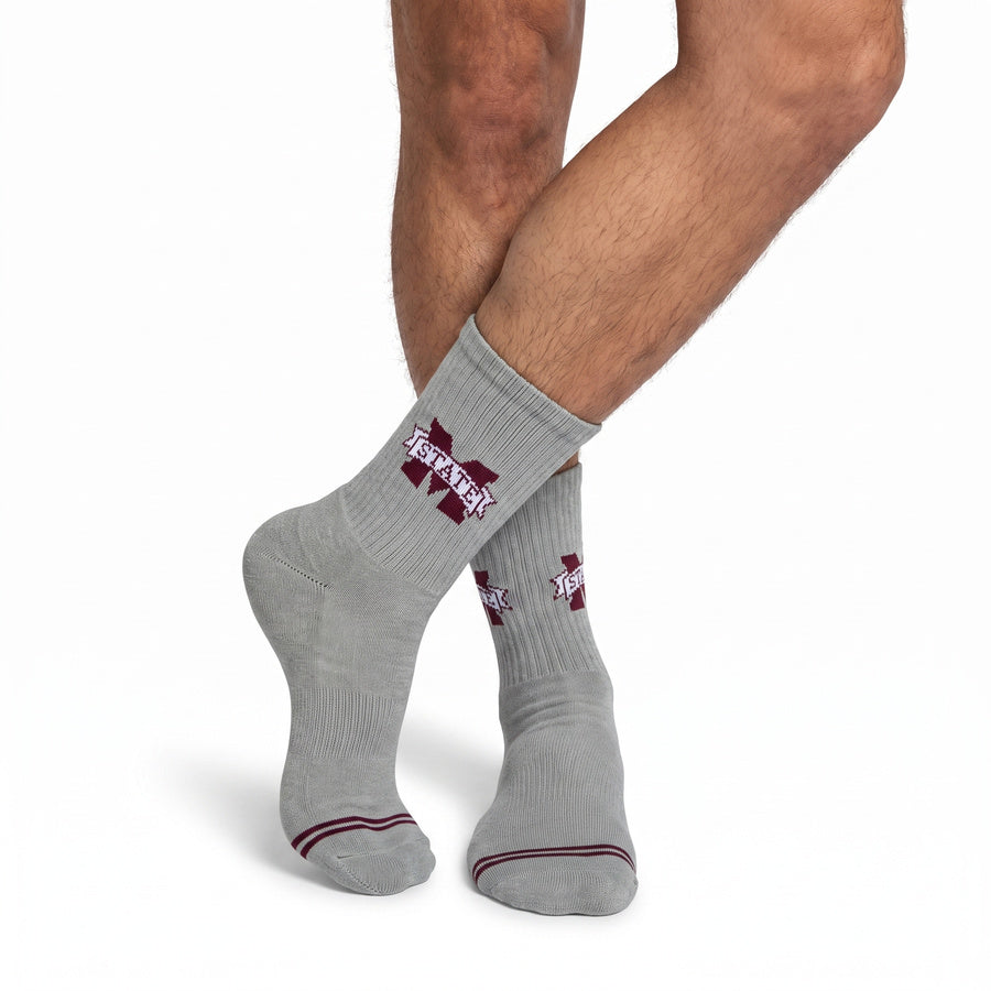 Gray M-State Logo Casual socks styled second angle, showing the maroon M-STATE banner logo on a heather-gray crew