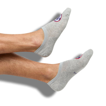 Grey no show liner socks with SIP on the top of the foot for Ole Miss on feet.