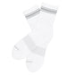 White and grey quarter crew socks laid flat to display full design and cushioning.