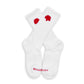 White casual crew socks with The Grove Collective logo on the calf.