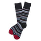 Black and white striped Jett dress sock laid flat showing full pattern and construction details.