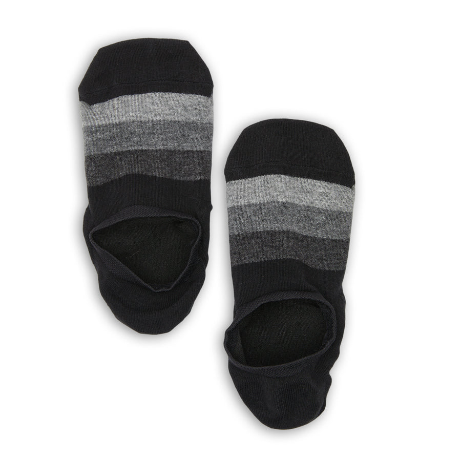 Jax no-show socks laid flat, showing black and grey colour-block design