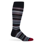 Black dress sock with vertical white stripes displayed upright against a white background.