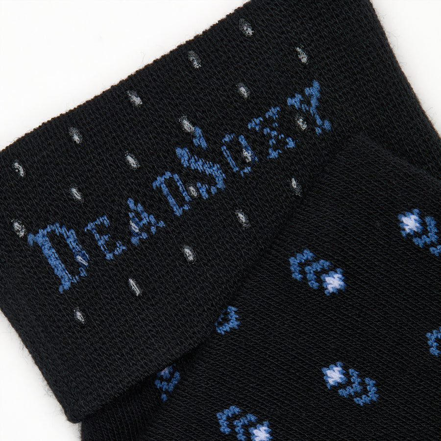 Close-up of Lloyd dress sock welt detail showing black ribbed cuff