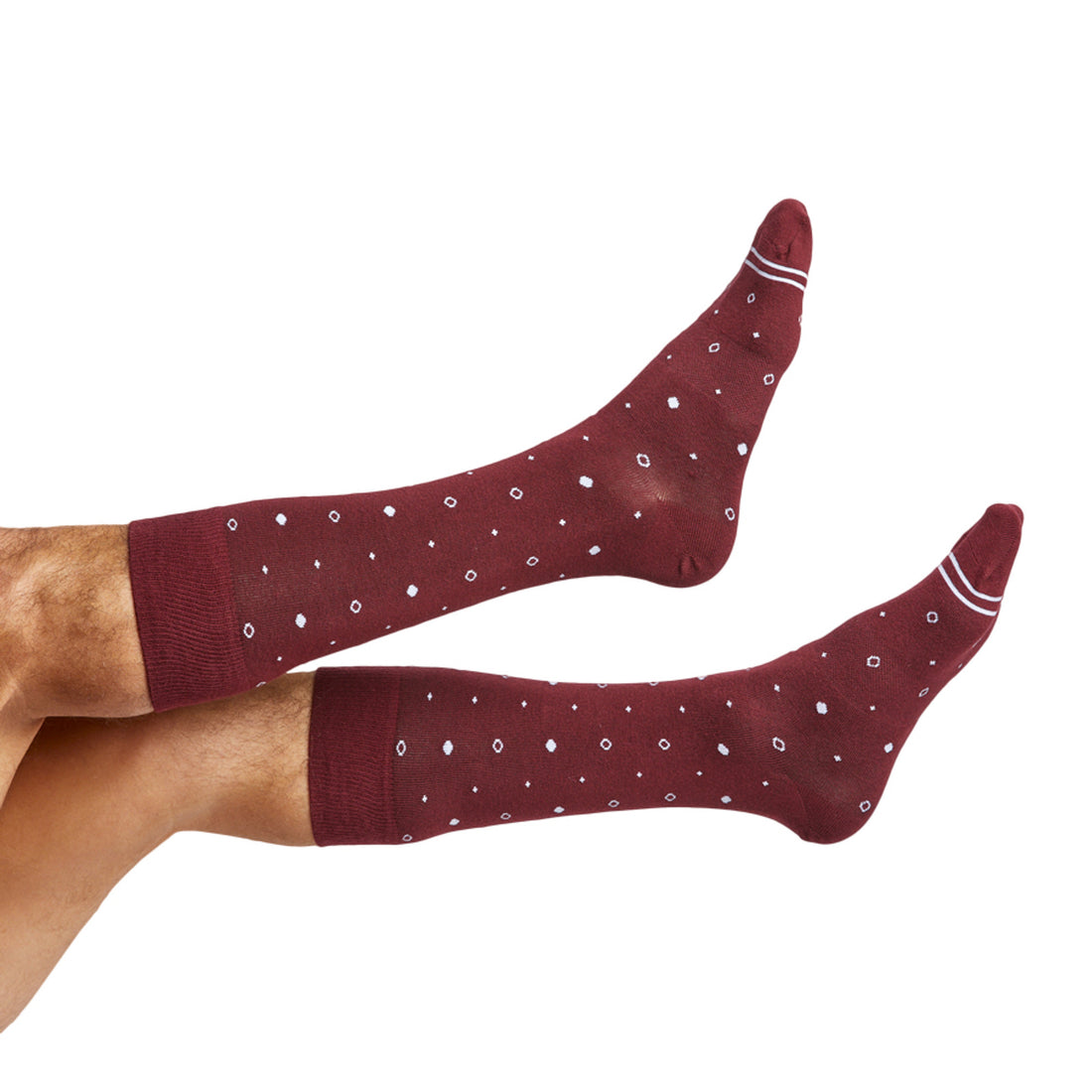 Maroon dress socks with white dots and two accent stripes on the toe shown on legs
