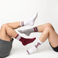 white howdy casual crew socks on a model in white sneakers