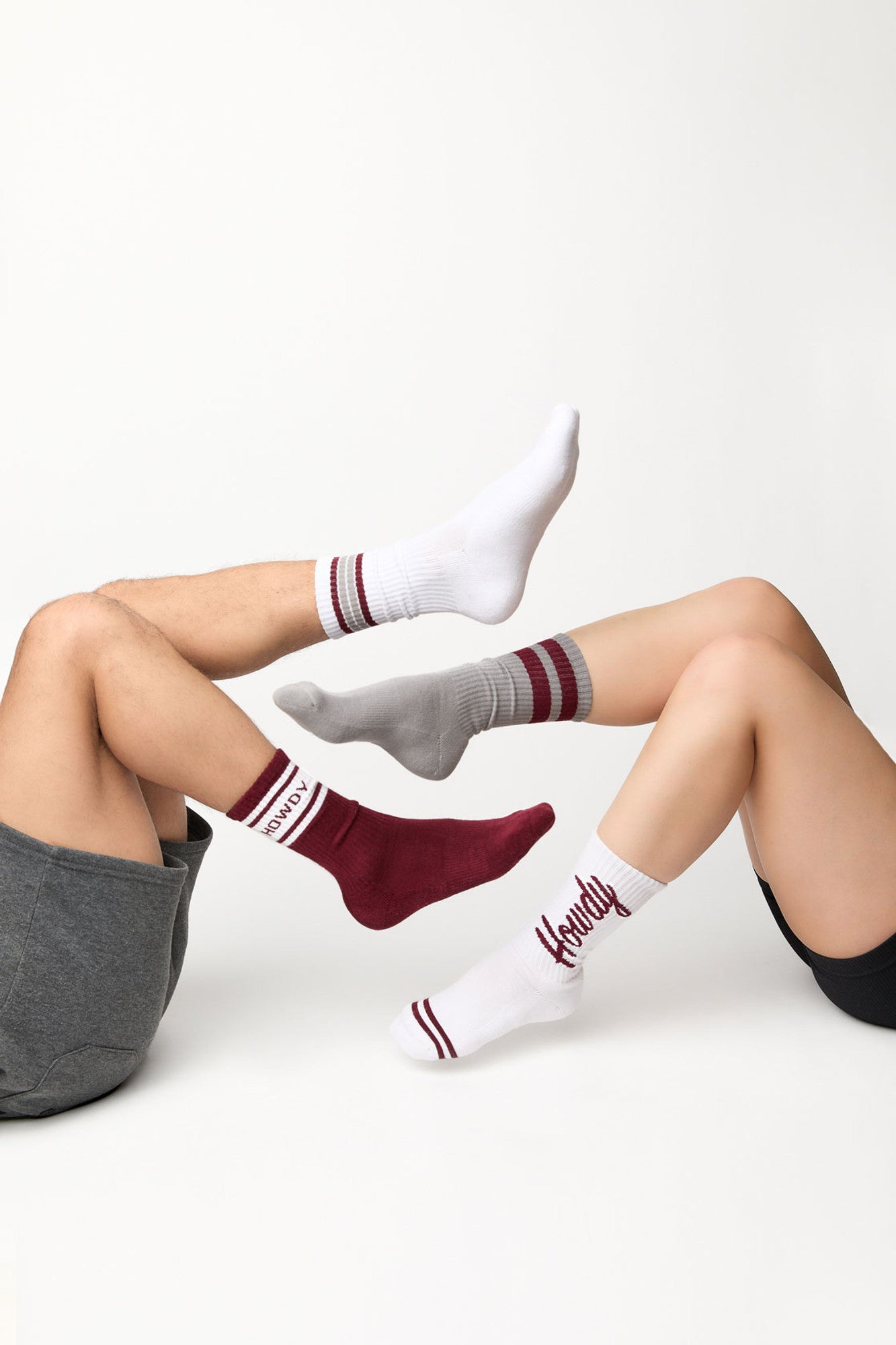 white howdy casual crew socks on a model in white sneakers