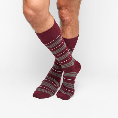 Maroon Triple Stripe Dress Sock with premium yarn and TrueStay technology shown on legs.