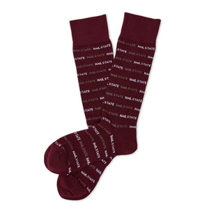 MSU Hail State Dress socks laid flat, showing repeating HAIL STATE text in white and gray on maroon